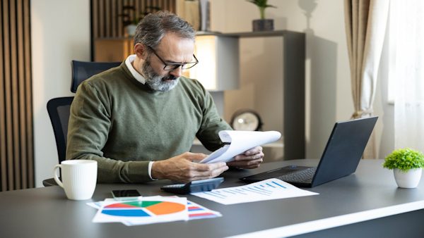 older adult reviewing training options